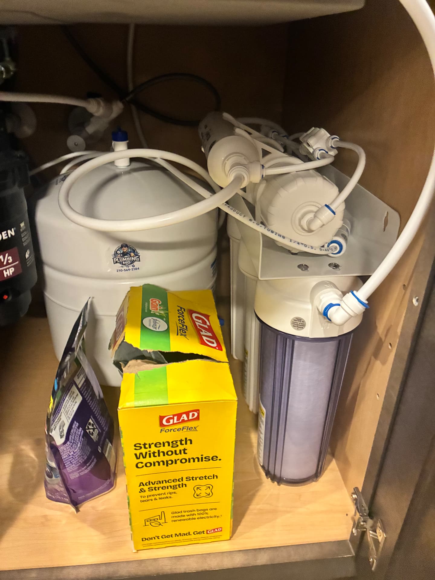 Reverse osmosis system installed under a kitchen sink